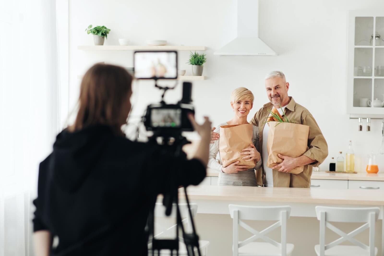 studio shoot and family at home with grocery shopping photographer with camera makes photo