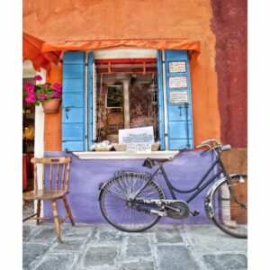 Burano a chair and a bicycle copy scaled